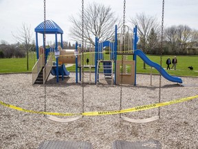 Will parents allow their children back on playground equipment like this at Westmount Lions Park? The city is opening them back up starting Saturday. (Derek Ruttan/The London Free Press)