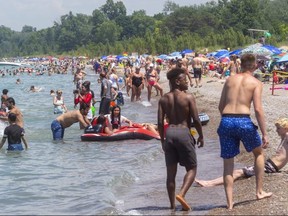 Lifeguards said the beach at Grand Bend on Canada Day held 6,000 to 7,000 people on July 1, 2020. Lots of Londoners were in the crowd as well as people from as far as Toronto on the hot sunny day. (Mike Hensen/The London Free Press)