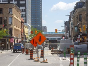 King Street already is down to a single lane at Richmond Street on Friday July 3, 2020, and will be closed next week for two months for critical sewer work that will improve the health of the Thames River.  (Mike Hensen/The London Free Press)