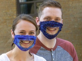 Taylor Bardell and Matt Urichuk are sewing masks with a clear inserts for deaf and hard of hearing children. (Mike Hensen/The London Free Press)
