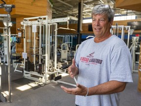 Alec Pinchin, the owner and president of Fitness Forum on Southdale Road, is excited to have people back in his gym starting Monday.  Pinchin had his staff in at work Wednesday July 15, 2020 learning how to clean and use a fogger to clean the machines after each group of clients moves through the gym.  (Mike Hensen/The London Free Press)