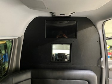 Partitions keep driver and passengers safe inside Wave Limousines.