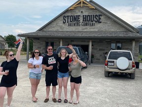 Greg McCarthy was treated in style on Father's Day to a tour of Huron County sites in a Wave Limousine by daughters (l-r): Nicole, Ashley, Vanessa and Alexis McCarthy.