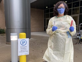 Jennifer Itterman, pediatric nurse case manager at Children's Hospital, leads a drive-up clinic so young cystic fibrosis patients can have routine throat swabs done from the safety of their vehicles during the pandemic. (Contributed/Children's Hospital at London Health Sciences Centre)