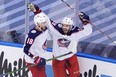 Liam Foudy, right, of the Columbus Blue Jackets celebrates his third-period goal with Pierre-Luc Dubois in Game 5 of the Eastern Conference Qualification Round against the Toronto Maple Leafs on Aug. 9 at Scotiabank Arena in Toronto. (Andre Ringuette/Freestyle Photo/Getty Images)