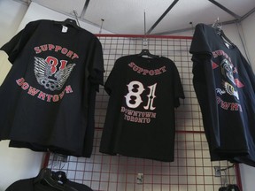 Buiying outlaw biker support gear, like these T-shorts, supports organized crime, OPP warn. (Postmedia files)