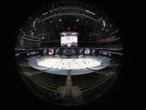 Londoner Dave Sandford is one of two photographers selected to capture images at ice-level inside the NHL's playoff bubble in Edmonton. (There are two others in the Toronto bubble.) This photo by Sandford shows Edmonton's Rogers Place during an exhibition game on July 29, just as the NHL prepared to start the playoffs. (Dave Sandford/NHL/USA Today Sports)
