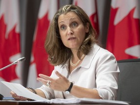 Deputy Prime Minister and Minister of Finance Chrystia Freeland responds to a question during a news conference Thursday August 20, 2020 in Ottawa. THE CANADIAN PRESS/Adrian Wyld ORG XMIT: ajw107