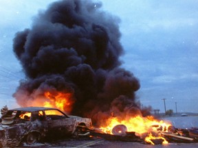 Fires burn as protests continued at Ipperwash, on Sept. 11, 1995 -- the day Anthony (Dudley) George was buried. He was shot dead by an Ontario Provincial Police sniper during a standoff over land that was a Canadian army base, and an adjacent provincial park, southwest of Grand Bend.