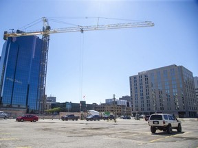 Construction of two new towers continues at the former Camden Terrace site on Talbot Street. (Derek Ruttan/The London Free Press)