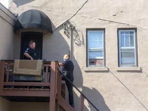 Strathroy police are investigating a double shooting that took place at the rear of a residence in an alley behind Frank Street in Strathroy Sunday afternoon.  Two men were injured, one has been released from hospital, and the suspect was seen running north on Frank Street. (Mike Hensen/The London Free Press)
