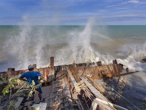 A London man who just a few years ago bought a cottage on Lake Huron is facing huge expenses for a retaining wall after his backyard started slumping into the lake. A breakwater cost the previous owner and nine neighbours $20,000 each, but it is rapidly falling apart, allowing water to undercut the sandy shore. (Mike Hensen/The London Free Press)