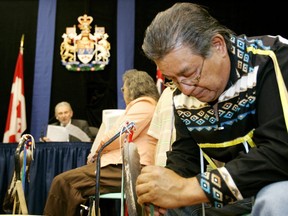 Sam George listens on the final day of the public inquiry into the 1995 shooting death of his brother, Dudley George, by OPP officer Ken Deane. Photograph taken Aug. 24, 2006. (Mike Hensen, The London Free Press)