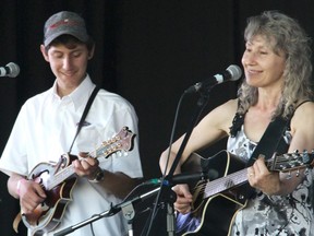 Charles, 17, and Susan Nelson of the Nelson Family Bluegrass band will be among the performers Friday through Sunday at the fifth annual Purple Hill Bluegrass Reunion in Thornadle. (Supplied)