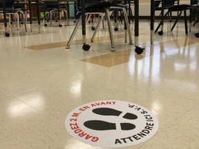 A marking for social distancing has been placed on the floor of a classroom at French school in London. (supplied photo)