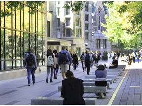 Students walk by the Redpath Library at McGill University. Young men are disproportionately represented in the "Not in Education, Employment nor Training" category, writes Rob Whitley.