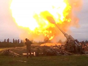 An image grab taken from a video made available on the official website of the Azerbaijani Defence Ministry on September 28, 2020, allegedly shows Azeri artillery strike towards the positions of Armenian separatists in the breakaway region of Nagorno-Karabakh. (Photo by Handout / Azerbaijani Defence Ministry / AFP)