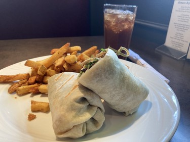 Chicken pesto wrap with fries and iced tea from Romeos Corner Cafe.