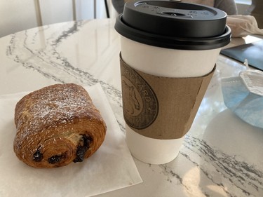 My chocolate croissant and medium roast coffee from The Livery Yard cafe.