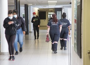Students walk the halls of Fanshawe College in London on Monday. More that 5,000 students attended Fanshawe College on its first day of classes for the 2020-2021 year. (Derek Ruttan/The London Free Press)