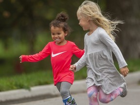 Nyella Smith, 2, and Ava Kruk, 4, run out ahead of their moms in Springbank Park in London. Photograph taken on Wednesday September 9, 2020.  Mike Hensen/The London Free Press