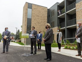 MP Peter Fragiskatos (L-London North Centre) speaks at Wednesday's federal-provincial affordable housing funding announcement in London. He joined Italian Seniors' Project president Roger Caranci, left, MPP Jeff Yurek (Con.-Elgin-Middlesex-London), London mayor Ed Holder, MPP Teresa Armstrong (NDP-London Fanshawe) and Ontario Housing Minister Steve Clark at the event. (Mike Hensen/The London Free Press)