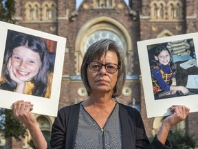 Irene Deschenes stands vigil outside St. Peter's Basilica, holding pictures of herself as a young girl. The vigil is in protest of the London Catholic diocese decision to take her to the Supreme Court as she continues legal action over childhood sexual abuse suffered at the hands of Father Charles Sylvestre. Photograph taken on Tuesday September 15, 2020.  Mike Hensen/The London Free Press