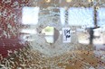 A bullet hole is left in a lobby window at 7230 Darcel Ave. in Malton after a drive-by shooting on Wednesday, Sept. 2, 2020. London got $3.09 million from a federal safer communities fund intended to help young people avoid gang activity.