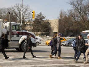 Western officials remind motorists to expect more traffic and to look out for pedestrians on and around the university campus as students return to classes. (Mike Hensen/The London Free Press)