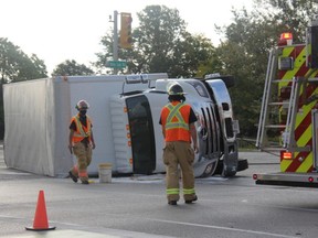 One person was treated for minor injuries, police said, following a Mondayr morning crash between a transport truck and vehicle at the intersection of Exeter and White Oak roads. JONATHAN JUHA/The London Free Press
