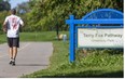 Brent Carrothers enters the Terry Fox Parkway as he attempted to retrace the Terry Fox run through London forty years ago in London. (Mike Hensen/The London Free Press)