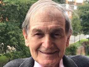 A handout picture released by Oxford University in England shows Roger Penrose posing on Tuesday in Oxford after winning the Nobel Physics Prize. Penrose, Reinhard Genzel of Germany and Andrea Ghez of the U.S. won the Nobel Physics Prize for their research into black holes. (AFP PHOTO /OXFORD UNIVERSITY)