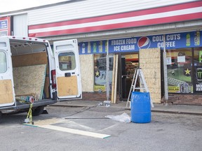 Repairs are underway at a variety store at 109 Rectory St. after the store and a citizen were struck by a vehicle early  on Wednesday October 7, 2020. (Derek Ruttan/The London Free Press)