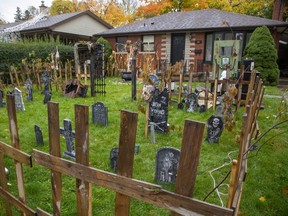 Stone spooky: Gary Sauds of 69 Wethered St. in London has turned his front yard into a graveyard. (Derek Ruttan/The London Free Press)