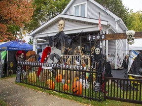 Skullabaloo: Ross Gibson started Halloween home styling for his 12-year-old daughter's party 20 years ago, and the display at 133 Saint Julien St. has grown every year since. (Derek Ruttan/The London Free Press)