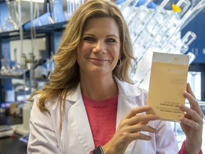 Jen Grant, a biochemical engineer, holds a hydrating toner infused with cannabis root extract. Grant is the founder of empyri, a skin-care line that uses extracts from marijuana and hemp plants. (Derek Ruttan/The London Free Press)