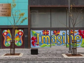 A row of empty storefronts is shown along the north side of the Dundas Street flex street in downtown London, where a mural was painted by Rich Denomme. Photograph taken on Monday October 26, 2020.  (Mike Hensen/The London Free Press)