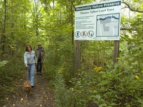 Londoners walk through the Meadowlily Nature Preserve, which is described as an "integral part" of the Meadowlily Woods environmentally sensitive area in east London. (Free Press file photo)
