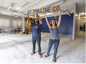 Heenal Rajani and Kara Rijnen of Reimagine Co. celebrate their crowdfunding success at the location of their planned zero-waste grocery store on Piccadilly Street in London. (Mike Hensen/The London Free Press)