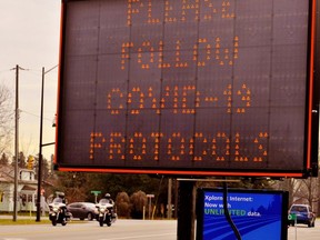 Norfolk County posted electronic signs at major approaches to Port Dover to remind visitors to follow COVID-19 protocols at the Friday the 13th motorcycle rally. – Monte Sonnenberg