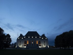 The Supreme Court of Canada is seen at sunset in Ottawa, Tuesday Sept. 1, 2020. The Supreme Court of Canada has affirmed that Ontario's sex-offender registry regime violates the constitutional rights of people found not criminally responsible by reason of mental disorder. (THE CANADIAN PRESS/Adrian Wyld)