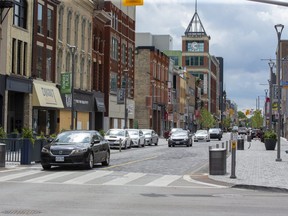 City politicians will debate a proposed pilot project next week to allow street vendors to sell their wares at specific locations on Dundas Place. (DEREK RUTTAN, The London Free Press)