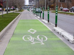 A new London cycling plan calls for projects to be spread around the city, not just in the core like this bicycle lane on King Street at Colborne Street. (Derek Ruttan/The London Free Press)
