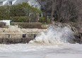 Still windy the day after a serious wind storm, waves crash into break walls at Little Beach in Port Stanley on Monday. (Derek Ruttan/The London Free Press)