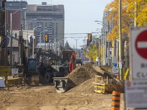 Massive construction involving water mains and sewers is keeping Dundas Street east of Adelaide Street closed in London. (Mike Hensen/The London Free Press)