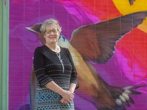 Barb Maly, the new executive director of Downtown London poses in Market Lane. (Mike Hensen/The London Free Press)