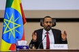 Ethiopian Prime Minister Abiy Ahmed gestures at the House of Peoples Representatives in Addis Ababa, Ethiopia, on November 30, 2020 to respond to the Parliament on the current conflict between Ethiopian National Defence Forces and the leaders of the Tigray Peoples Liberation Front (TPLF). - Ethiopian Prime Minister Abiy Ahmed said on November 30, 2020 Tigray region's dissident leaders had fled west of the regional capital after weeks of fighting, but said federal forces were monitoring them closely and would "attack" them soon.

Abiy, winner of last year's Nobel Peace Prize, this month ordered military operations against leaders of Tigray's ruling party, the Tigray People's Liberation Front (TPLF), in response to what he said were TPLF-organised attacks on Ethiopian federal army camps. (Photo by AMANUEL SILESHI/AFP via Getty Images)