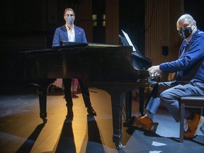 Music promoter Brad Jones, president of Jones Entertainment Group, (left) and Joe Kool's owner Mike Smith had hoped to bring the first live touring show to London since the pandemic hit, The Dueling Pianos Show featuring Shane Young and Jenesse Graling, both of Edmonton, on stage surrounding the pianos. Photo shot in London, Ont. on Wednesday December 2, 2020. (Derek Ruttan/The London Free Press)