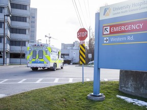 Two employees from the Ministry of Labour, Training and Skills Development visited University Hospital on Nov. 30 to investigate a workplace illness. The hospital is dealing with a COVID-19 outbreak that has killed 13 patients. (Derek Ruttan/The London Free Press)