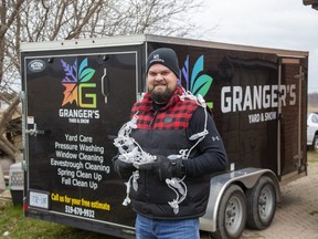 Mat Granger whose company Granger 's Yard and Snow has given away Christmas lights to two families who are in need. (Derek Ruttan/The London Free Press)